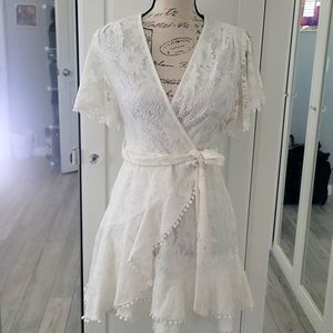 Saints + Secrets Lace Wrap Dress